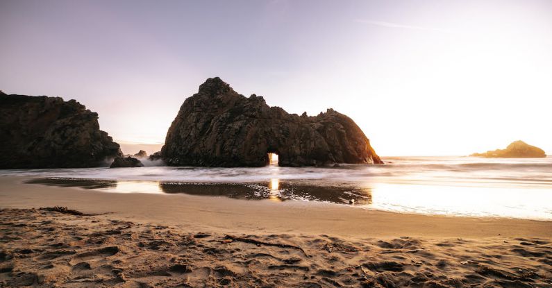 Quiet Beaches - Photo of Seashore During Golden Hour