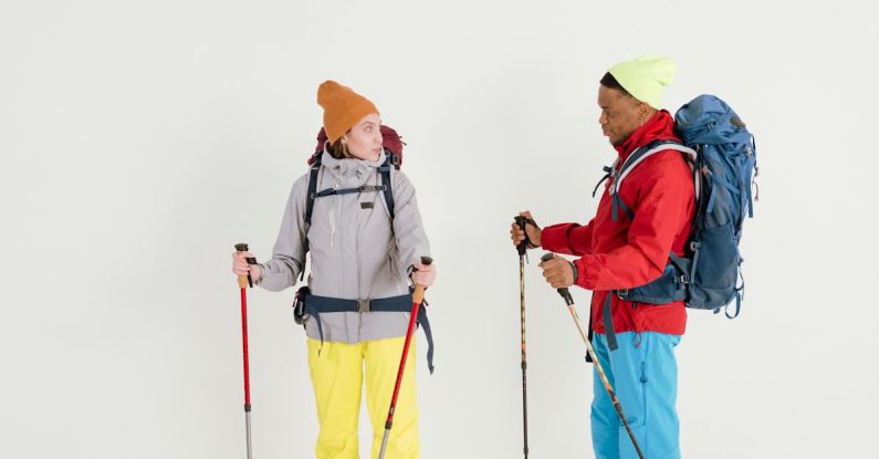 Hiking - Two People in Complete Trekking Gears