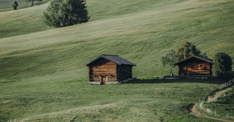 Mountain Cabins - Wooden Cabins on Hill in Mountain Landscape