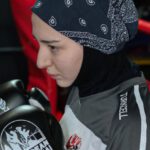 High-Altitude Training - A young woman wearing a headscarf and boxing gloves