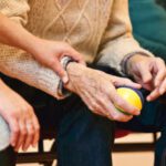 Volunteer - Person Holding a Stress Ball