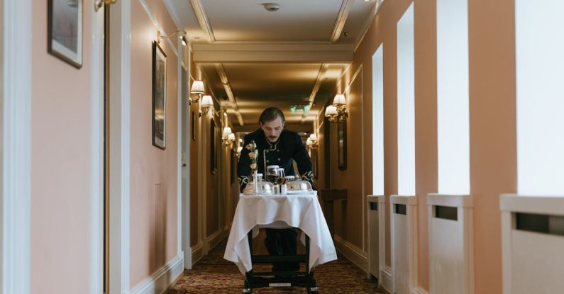 Concierge Services - Guest Service Staff pulling a Serving Tray