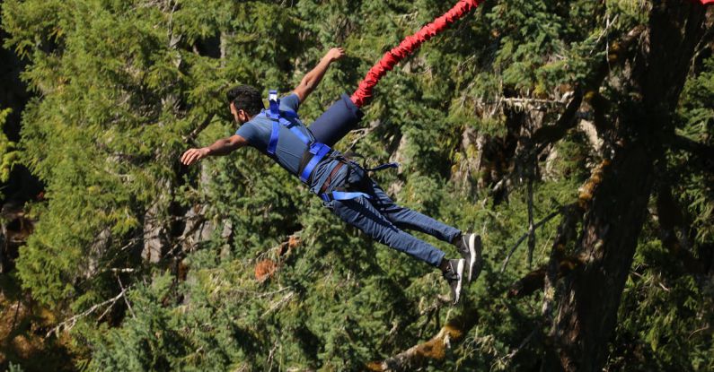 Bungee Jumping - Photo of Man Jumping