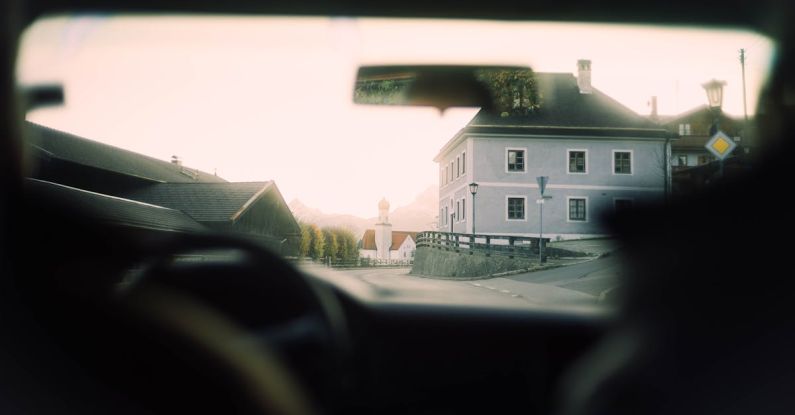 Road Trip - White Painted Building Beside Road