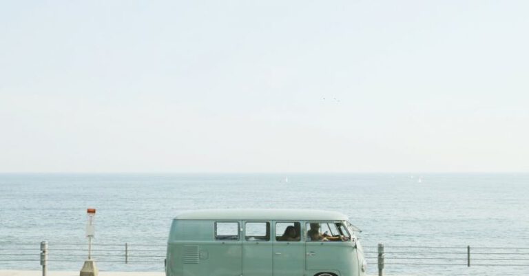 Van - Van Parked Beside the Road Near Handrail and Ocean
