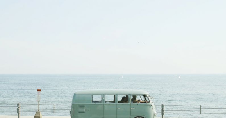 Van - Van Parked Beside the Road Near Handrail and Ocean