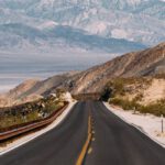 Scenic Drives - Empty Gray Road Under White Clouds