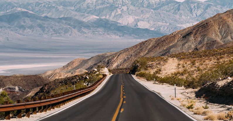 Scenic Drives - Empty Gray Road Under White Clouds